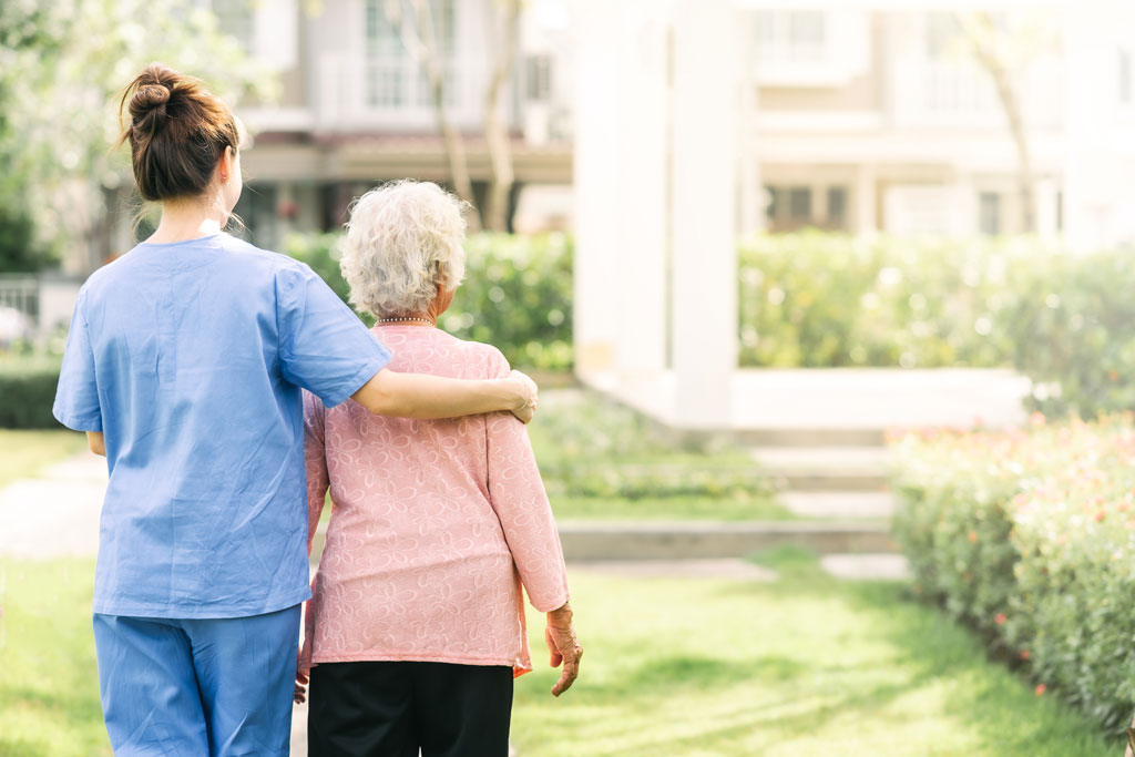 prairie lake senior receiving support from care aide